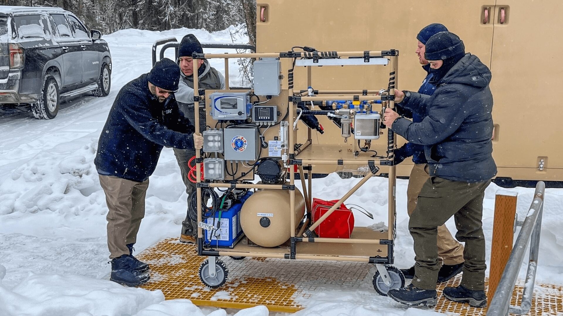 Deployable Resilient Installation water Purification and treatment System (DRIPS) being transported in a cold environment